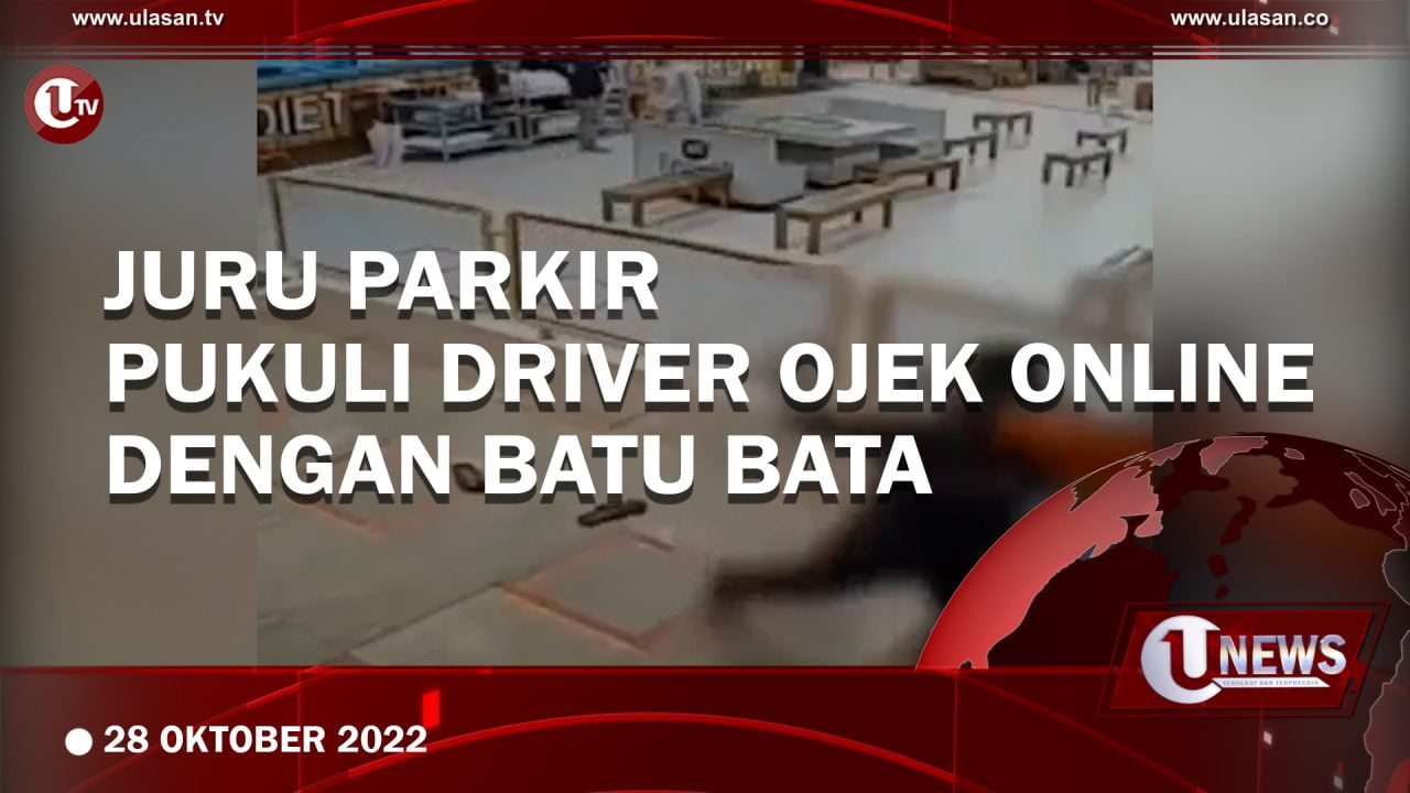 [Video] Juru Parkir Pukuli Driver Ojek Online dengan Batu