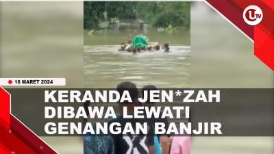 [Video] Keranda Jenazah Dibawa dengan Batang Pisang Lewati Banjir
