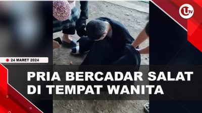 [Video] Kepergok, Pria Bercadar Salat di Tempat Jemaah Wanita