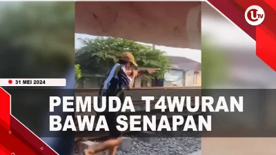 [Video] Pemuda Bawa Senapan saat Tawuran dengan Geng Motor