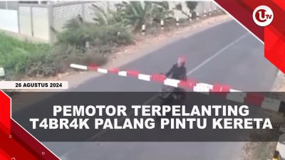 [VIDEO] Pemotor Ngebut Tabrak Palang Pintu Kereta Hingga Patah