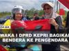 [VIDEO] Peringati Hari Kemerdekaan, Waka I DPRD Kepri Bagikan Bendera Ke Pengendara | U-NEWS